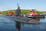 The tugs Paul A. & John P. Wronowski help move the Virginia-clas