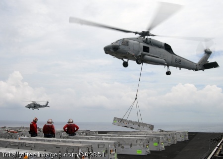 100914-N-1638S-153
PACIFIC OCEAN (Sept. 14, 2010) An SH-60F Sea Hawk helicopter assigned to the Indians of Helicopter Anti-Submarine Squadron (HS) 6 airlifts ordnance from the flight deck of the aircraft carrier USS Nimitz (CVN 68) during an ammunition offload. Nimitz is conducting blue water operations in the U.S. 3rd Fleet area of responsibility. (U.S. Navy photo by Mass Communication Specialist Seaman Thomas Siniff/Released)