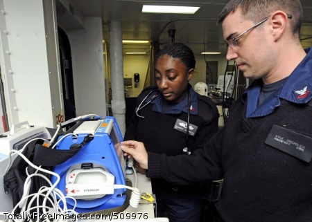 100907-N-3154P-012
ATLANTIC OCEAN (Sept. 7, 2010) Hospital Corpsman 2nd Class Antoinette Saunders, left, and Hospital Corpsman 2nd Class Kyle Drehsler, assigned to the medical department aboard the amphibious assault ship USS Kearsarge (LHD 3), perform a safety check on a heart defibrillator. The Kearsarge Amphibious Ready Group (ARG) is en route to Pakistan to help provide relief to flood-stricken regions. (U.S. Navy photo by Mass Communication Specialist 3rd Class Scott Pittman/Released)