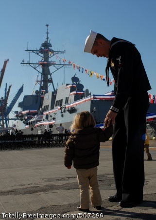 101120-N-3737T-014
WILMINGTON, N.C. (Nov. 20, 2010) Hours before the official ceremony, Gunner's Mate 3rd Class Zachary Fleming walks with his daughter near the ship. The U.S. Navy commissioned its newest guided missile destroyer, USS Gravely (DDG 107). The new destroyer honors the late Vice Adm. Samuel L. Gravely Jr., who was the first African American to command a warship, USS Theodore E. Chandler (DD 717); to command a major warship, USS Jouett (DLG/CG-29); to achieve flag rank and eventually vice admiral; and to command a numbered fleet, the U.S. 3rd Fleet. (U.S. Navy photo by Mass Communication Specialist 2nd Class Eric Tretter/Released)