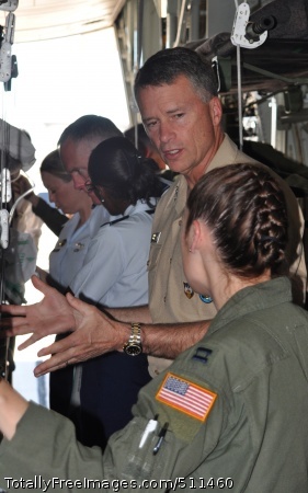 ETERSON AIR FORCE BASE, Colo. – Navy Adm. James A. Winnefeld, Jr., discusses the challenges of aeromedical evacuation with Air Force Capt. Carrie Williamson (foreground) July 26 at Peterson Air Force Base, Colo. Winnefeld, commander of both the North American Aerospace Defense Command and U.S. Northern Command, together with senior leaders from both commands, visited the Air Force Reserve’s 302nd Airlift Wing to gain a better understanding of the specialized missions the AF Reserve supports, to include aeromedical evacuation and aerial firefighting. The visit also showcased the capabilities Air Force Reservists can provide to civilian-related missions if called upon. Williamson is flight nurse and Air Reserve Technician within the 302nd AW.