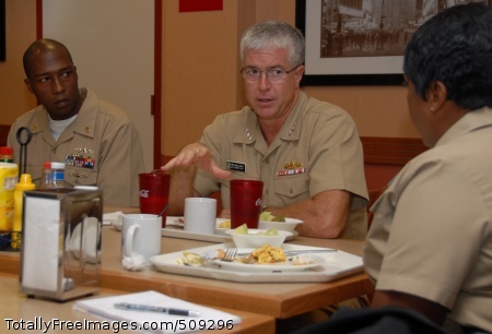 100930-N-6764G-046
NORFOLK (Sept. 30, 2010) Vice Adm. Daniel P. Holloway, commander of U.S. 2nd Fleet, middle, discusses leadership responsibilities with Chief Electronics Technician Bobbie Branch, left, and Master Chief Information Systems Technician Yvonne Kitchen during a breakfast with U.S. 2nd Fleet's new chief petty officers at the galley at Naval Station Norfolk. (U.S. Navy photo by Mass Communication Specialist 3rd Class Brian Goodwin/Released)