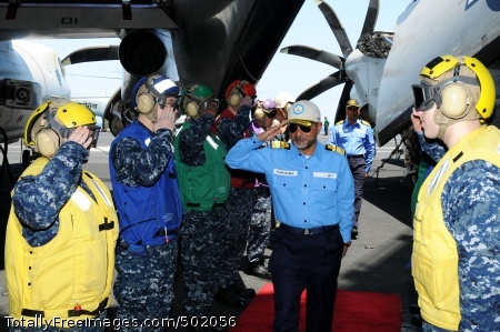 110408-N-IC111-016
PACIFIC OCEAN (April 8, 2011) Indian navy Rear Adm. Harish Bisht, flag officer of Commanding Eastern Fleet, returns honors as he walks through rainbow side boys aboard the aircraft carrier USS Ronald Reagan (CVN 76). Ronald Reagan is participating in Exercise Malabar, a bi-lateral coordination with the Indian navy and is operating in the western Pacific Ocean. (U.S. Navy photo by Mass Communication Specialist 3rd Class Kevin B. Gray/Released) 
