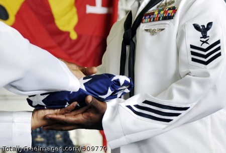 100915-N-6003P-080
ARABIAN SEA (Sept. 15, 2010) Sailors pass the flag during the reading of Old Glory at the 9/11 Memorial Remembrance Ceremony aboard the aircraft carrier USS Harry S. Truman (CVN 75). Harry S. Truman is deployed as part of the Harry S. Truman Carrier Strike Group supporting maritime security operations and theater security cooperation efforts in the U.S. 5th Fleet area of responsibility. (U.S. Navy photo by Mass Communication Specialist 2nd Class Kilho Park/Released)
