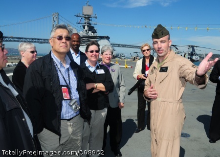 101008-N-3570S-179
SAN FRANCISCO (Oct. 8, 2010) Maj. Dan Mcguire, assigned to Marine Light Attack Helicopter Squadron (HMLA) 367, gives a tour of the Navy's newest amphibious assault ship USS Makin Island (LHD 8) to members of the Citizen Emergency Response Volunteers of the Bay Area during San Francisco Fleet Week 2010. The five-day event highlights the equipment, technology and operational capabilities of the military's sea services and their history with the San Francisco area. (U.S. Navy photo by Mass Communication Specialist 2nd Class Jeremy M. Starr/Released) 