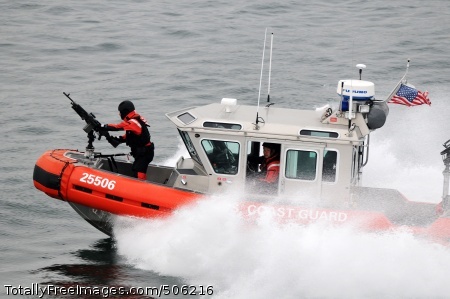 101215-N-0232G-100
SAN DIEGO (Dec. 15, 2010) U.S. Coast Guardsmen aboard a security patrol craft escort the aircraft carrier USS Ronald Reagan (CVN 76) out of San Diego Harbor as the ship heads to sea. The Coast Guard provides security escorts for U.S. Navy ships during harbor transits. Ronald Reagan is underway conducting operations in preparation for an upcoming deployment. (U.S. Navy photo by Mass Communication Specialist 3rd Class Kevin B. Gray/Released)