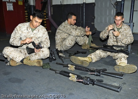 100906-N-3154P-039
ATLANTIC OCEAN (Sept. 6, 2010) Marines assigned to the 26th Marine Expeditionary Unit (26th MEU), clean, preserve and lubricate their weapons aboard the amphibious assault ship USS Kearsarge (LHD 3). The Kearsarge Amphibious Ready Group (ARG) is en route to Pakistan to help provide relief to flood-stricken regions. (U.S. Navy photo by Mass Communication Specialist 3rd Class Scott Pittman/Released)