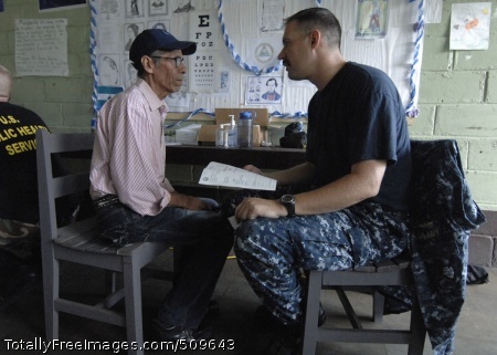 100917-N-7656R-036
BLUEFIELDS, Nicaragua (Sept. 17, 2010) Lt. Cmdr. Tyler Miles, embarked aboard the multi-purpose amphibious assault ship USS Iwo Jima (LHD 7), talks to a patient about his eyesight during a Continuing Promise 2010 medical community service project. The assigned medical and engineering staff embarked aboard Iwo Jima are working with partner nations to provide medical, dental, veterinary, and engineering assistance in several nations to improve mutual understanding of current medical issues and technology. (U.S. Navy photo by Mass Communications Specialist 1st Class Eric J. Rowley/Released)