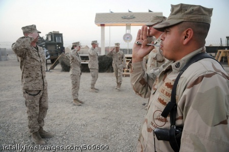 100916-N-0475R-157
HELMAND PROVINCE, Afghanistan (Sept. 16, 2010) Chief Boatswain's Mate Rafael Escoto, right, assigned to the Naval Mobile Construction Battalion (NMCB) 5, pipes aboard Chief Equipment Operator Thomas Colesanti for the first time during a chief petty officer pinning ceremony at Camp Leatherneck, Afghanistan. The Seabees of NMCB-5 are deployed to Afghanistan executing general engineering, infrastructure construction and project management supporting Operation Enduring Freedom. (U.S. Navy photo by Mass Communication Specialist 2nd Class Ace Rheaume/Released) 