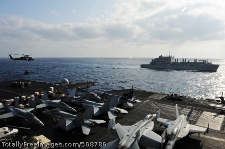 101013-N-6427M-114
ARABIAN SEA (Oct. 13, 2010) The aircraft carrier USS Harry S. Truman (CVN 75) conducts a vertical replenishment with the Military Sealift Command dry cargo and ammunition ship USNS Sacagawea (T-AKE 2). The Harry S. Truman Carrier Strike Group is deployed supporting maritime security operations and theater security cooperation efforts in the U.S. 5th Fleet area of responsibility. (U.S. Navy photo by Mass Communication Specialist Seaman Ryan McLearnon/Released)