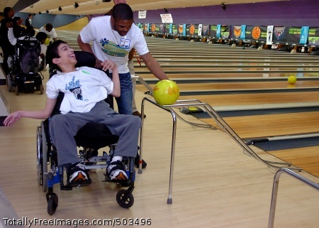 110304-N-KV696-095
HYATTSVILLE, Md. (March 4, 2011) Master-at-Arms Seaman Quentin Benjamin, assigned to Naval Support Activity Washington, helps a Special Olympics bowler during the final tournament of the Special Olympics Bowling Championships held at AMF Capital Plaza Lanes in Hyattsville, Md. Naval District Washington assists the District of Columbia Special Olympics Program several times a year with various sporting events. (U.S. Navy photo by Mass Communication Specialist 2nd Class Kiona Miller/Released) 