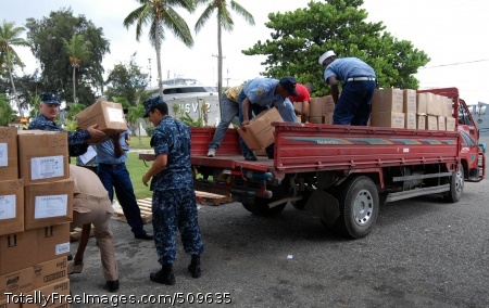 100920-N-4971L-117
SANTO DOMINGO, Dominican Republic, (Sept. 19, 2010) Sailors embarked aboard High Speed Vessel Swift (HSV 2) and members of the Dominican Republic defense forces load pallets of Project Handclasp aid onto trucks for delivery to relief organizations. Swift is deployed supporting Southern Partnership Station 2010, a deployment of various specialty platforms to the U.S. Southern Command area of responsibility in the Caribbean and Central America. Southern Partnership Station is an information-sharing mission with navies, coast guards, and civilian services throughout the region. Project Handclasp transports educational, humanitarian and goodwill materials on a space-available basis aboard U.S. Navy ships. (U.S. Navy photo by Mass Communication Specialist 1st Class Rachael L. Leslie/Released) 