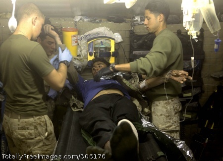 101206-M-7825S-062
SANGIN, Afghanistan (Dec. 6, 2010) Hospital Corpsmen assigned to 3rd Battalion, 5th Marine Regiment and 1st Marine Logistics Group render medical assistance to an Afghan National Army soldier at Forward Operating Base Jackson. The battalion is one of the combat elements of Regimental Combat Team 2 conducting counterinsurgency operations in partnership with the International Security Assistance Force. (U.S. Marine Corps photo by Sgt. Artur Shvartsberg/Released)