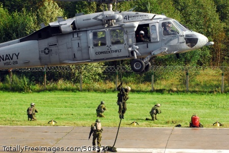 100917-A-0629C-046
KLAIPEDA, Lithuania (Sept. 17, 2010) Special operations forces soldiers from Lithuania, Poland, and the U.S. conduct fast rope training from a U.S. Navy MH-60 Sea Hawk helicopter before the start of the Jackal Stone 10 exercise. Jackal Stone 10, hosted by Poland and Lithuania, is an annual international special operations forces exercise in Europe, designed to enhance capabilities and interoperability among participating special operations forces. (U.S. Army photo by Pfc. Christopher A. Calvert/Released) 