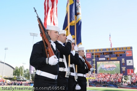 100918-N-8119A-042
SEATTLE (Sept. 18, 2010) Sailors assigned to the Ohio-class fleet ballistic missile submarine USS Nebraska (SSBN 739) (Gold) Color Guard present the colors before the kickoff of the University of Washington and University of Nebraska college football game. (U.S. Navy photo by Mass Communication Specialist 2nd Class Gretchen Albrecht/Released)