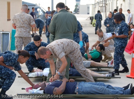 100923-N-6106P-002
JACKSONVILLE, Fla. (Sept. 23, 2010) Members of the Naval Health Clinic Jacksonville medical staff conduct a mass casualty drill. (U.S. Navy photo by Clark Pierce/Released)