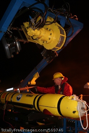 100914-N-1038B-002
NORTH SEA (Sept. 14, 2010) Oceanographer Kevin Dial of the Naval Oceanographic Office rinses one of the autonomous underwater vehicles after safely recovering it from the waters of the North Sea onto the Military Sealift Command oceanographic survey ship USNS Henson (T-AGS 63). (U.S. Navy photo by Rebecca Burke/Released)