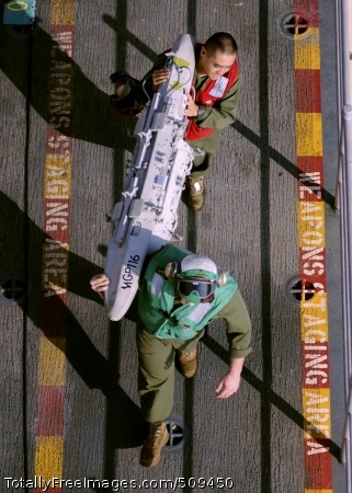 100925-N-9950J-080
PHILIPPINE SEA (Sept. 25, 2010) Sgt. Jeff Bartlett, top, and Cpl. Kevin Carter, both assigned to Marine Attack Squadron (VMA) 542, move an AV-8B Harrier jet aircraft triple ejector rack aboard the forward-deployed amphibious assault ship USS Essex (LHD 2). Essex is part of the forward-deployed Essex Amphibious Ready Group and is underway in the Western Pacific. (U.S. Navy photo by Mass Communication Specialist 2nd Class Greg Johnson/Released)