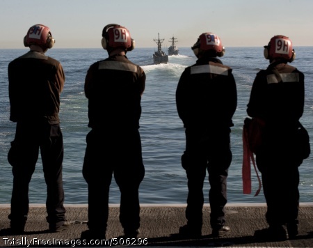 101212-N-7981E-503
PACIFIC OCEAN (Dec. 12, 2010) Sailors assigned to the Helicopter Anti-submarine Squadron (HS) 15 watch from the flight deck of the aircraft carrier USS Carl Vinson (CVN 70) as ships assigned to the Carl Vinson Carrier Strike Group maneuver during a simulated straits transit. Carl Vinson and Carrier Air Wing (CVW) 17 are on a three-week composite training unit exercise to be followed by a deployment to the western Pacific Ocean. (U.S. Navy photo by Mass Communication Specialist 2nd Class James R. Evans/Released) 