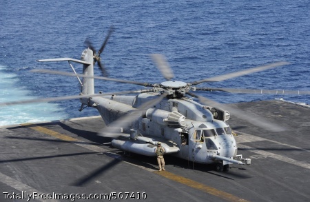 101115-N-3793B-457
ARABIAN SEA (Nov. 15, 2010) A CH-53E Super Stallion helicopter assigned to the Fighting Griffins of Marine Medium Tiltrotor Squadron (VMM) 266 receives fuel and supplies aboard the aircraft carrier USS Harry S. Truman (CVN 75) duirng a logistics and re-fueling stop en-route to the amphibious assault ship USS Kearsarge (LHD 3). VMM-266 is assigned to the 26th Marine Expeditionary Unit (26th MEU) and concluded their support of humanitarian and disaster relief efforts in Pakistan. (U.S. Navy photo by Mass Communication Specialist 3rd Class Marie Brindovas/Released) 