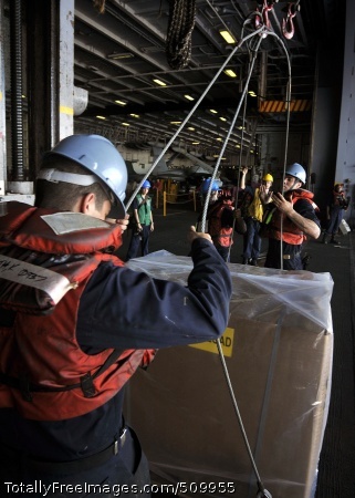 100911-N-7103C-059
PACIFIC OCEAN (Sept. 11, 2010) Seaman Kyle Smith, from Greenville, S.C., helps rig a cargo pallet to a sliding pad-eye during a replenishment at sea with the Military Sealift Command fleet replenishment oiler ship USNS John Ericsson (T-AO 194) aboard the aircraft carrier USS George Washington (CVN 73). George Washington, the Navy's only permanently forward-deployed aircraft carrier, is underway helping to ensure security and stability in the western Pacific Ocean. (U.S. Navy photo by Mass Communication Specialist 3rd Class David A. Cox/Released) 