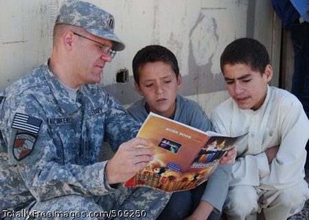 101003-N-7062A-001
CAMP SHAHEEN, Afghanistan (Oct. 3, 2010) Lt. Matthew Marcinkiewicz practices reading English with children of soldiers from the Afghan National Army. Marcinkiewicz is deployed to Afghanistan for seven months from Yokosuka Naval Base, Japan, as part of the NATO Training Mission-Afghanistan Medical Embedded Training Team to assist in the development and training of his Afghan counterparts at the 209th Corps Regional Hospital. (U.S. Navy photo by Sandra Arnold/Released) 