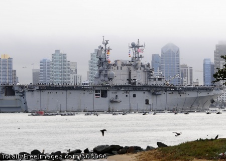 101218-N-8607R-026
SAN DIEGO (Dec. 18, 2010) The amphibious assault ship USS Peleliu (LHA 5) transits San Diego Harbor after a seven-month deployment. The Peleliu Amphibious Ready Group deployed to the U.S. 7th and U.S. 5th Fleet areas of responsibility conducting humanitarian relief in Pakistan and counter-piracy operations off the Horn of Africa. (U.S. Navy photo by Mass Communication Specialist 2nd Class Eva-Marie Ramsaran/Released) 