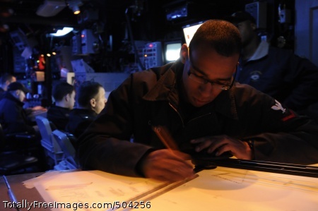 110209-N-9094S-020
PACIFIC OCEAN (Feb. 9, 2011) Operations Specialist 3rd Class Eric Castillo plots course markings on a digital dead reckoning tracer in the combat information center aboard the U.S. 7th Fleet command ship USS Blue Ridge (LCC 19). Blue Ridge serves under Commander, Expeditionary Strike Group (ESG) 7/Task Force (CTF) 76, the Navy's only forward deployed amphibious force. (U.S. Navy photo by Mass Communication Specialist 3rd Class Brian A. Stone/Released)