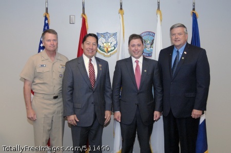 p>PETERSON AIR FORCE BASE, Colo. - Navy Adm. James Winnefeld, Lionel Rivera, Christian Anschutz and Kevin Estrem pose for a photo during the Commander's Community Leader Commendation Ceremony at NORAD and USNORTHCOM headquarters July 29.