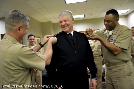 110303-N-ZB612-042
WASHINGTON (March 3, 2011) Chief of Naval Operations (CNO) Adm. Gary Roughead is made an honorary Master Chief by Mast Chief Petty Officer of the Navy (MCPON) Rick West and Master Chief Yeoman Mack Alston during a ceremony in the Pentagon. (U.S. Navy photos by Chief Mass Communication Specialist Tiffini Jones Vanderwyst/Released) 