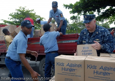 100920-N-4971L-095
SANTO DOMINGO, Dominican Republic (Sept. 20, 2010) Lt. Cmdr. Ken Cremeans, right, deputy mission commander of Southern Partnership Station 2010, helps members of the Dominican Republic defense forces load pallets of Project Handclasp humanitarian aid delivered by High Speed Vessel Swift (HSV 2). Project Handclasp transports educational, humanitarian and goodwill materials on a space-available basis aboard U.S. Navy ships. Swift is supporting Southern Partnership Station, a deployment of various specialty platforms to the U.S. Southern Command area of responsibility in the Caribbean and Central America. (U.S. Navy photo by Mass Communication Specialist 1st Class Rachael L. Leslie/Released) 
