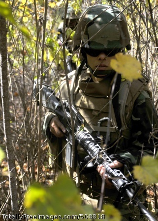 101011-N-4440L-170
CAMP SHELBY, Miss. (Oct. 11, 2010) Builder Constructionman Ana Serrano, assigned to Delta Company of Naval Mobile Construction Battalion (NMCB) 74, conducts a foot patrol through thick brush during the battalion's Field Training Exercise. NMCB-74 is in the field at Camp Shelby, Miss. conducting their field training before deploying later this year. (U.S. Navy photo by Mass Communication Specialist 2nd Class Michael Lindsey/Released) 