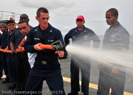 110524-N-BK435-123
PACIFIC OCEAN (May 24, 2011) Sailors and civilian mariners assigned to the submarine tender USS Frank Cable (AS 40) practice hose handling procedures. Frank Cable conducts maintenance and support of submarines and surface vessels deployed in the U.S. 7th Fleet area of responsibility. (U.S. Navy photo by Mass Communication Specialist 2nd Class Jeremy Starr/Released)