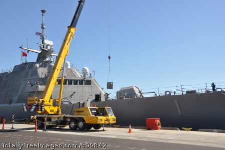 100914-N-8951S-062
SEAL BEACH, Calif. (Sept. 14, 2010) A box containing 57mm gun rounds is loaded aboard the littoral combat ship USS Freedom (LCS 1) during ordnance operations at Naval Weapons Station Seal Beach. Freedom is at the weapons station conducting the first major Pacific Fleet ordnance operation for an LCS-class vessel. (U.S. Navy photo by Gregg Smith/Released)